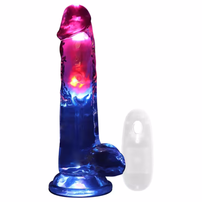 REALROCK - vibrátor s semenníkmi - svietiaci - 20 cm